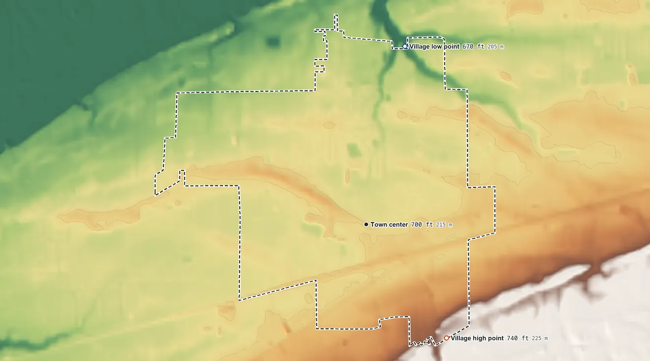 Topographic elevation map of Perry, Ohio, shaded from 670 ft on the north side to 740 ft on the southeast side