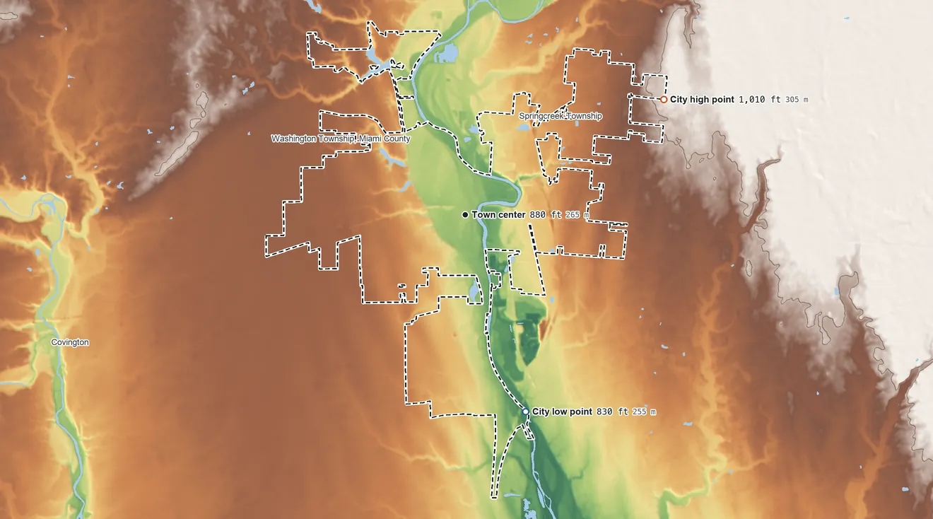 Topographic elevation map of Piqua, Ohio, shaded from 830 ft on the south side to 1,010 ft on the northeast side