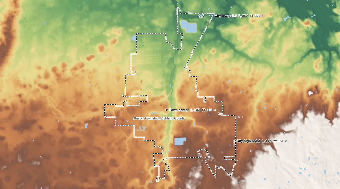 Topographic elevation map of Shelby, Ohio, shaded from 1,060 ft on the northeast side to 1,140 ft on the southeast side