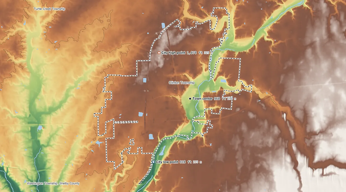 Topographic elevation map of Sidney, Ohio, shaded from 910 ft on the southwest side to 1,070 ft on the northwest side