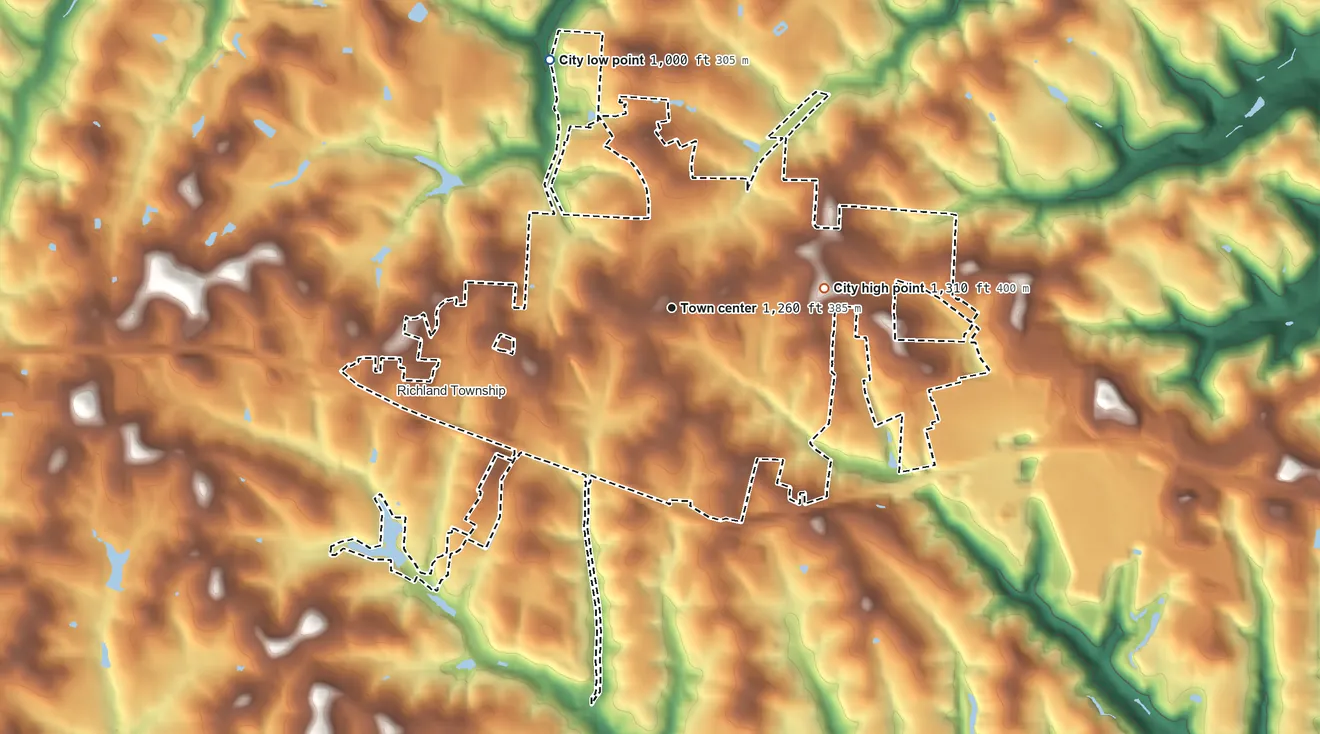 Topographic elevation map of St. Clairsville, Ohio, shaded from 1,000 ft on the northwest side to 1,310 ft on the east side
