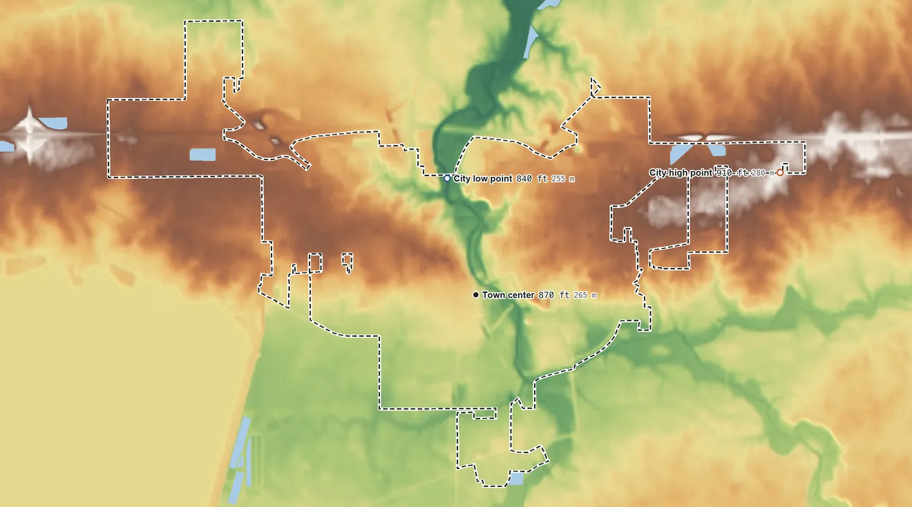 Topographic elevation map of St. Marys, Ohio, shaded from 840 ft on the north side to 910 ft on the east side
