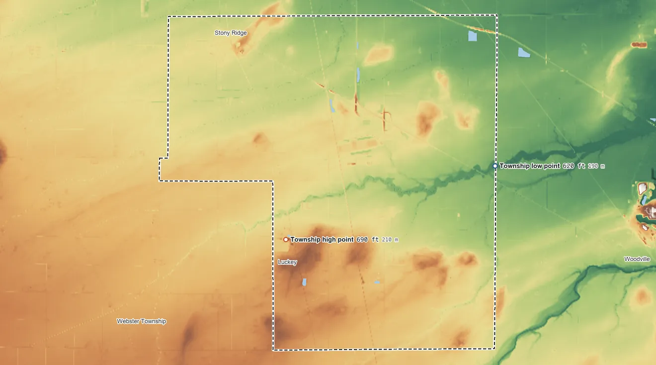 Topographic elevation map of Troy Township, Wood County, Ohio, shaded from 620 ft on the east side to 690 ft on the southwest side