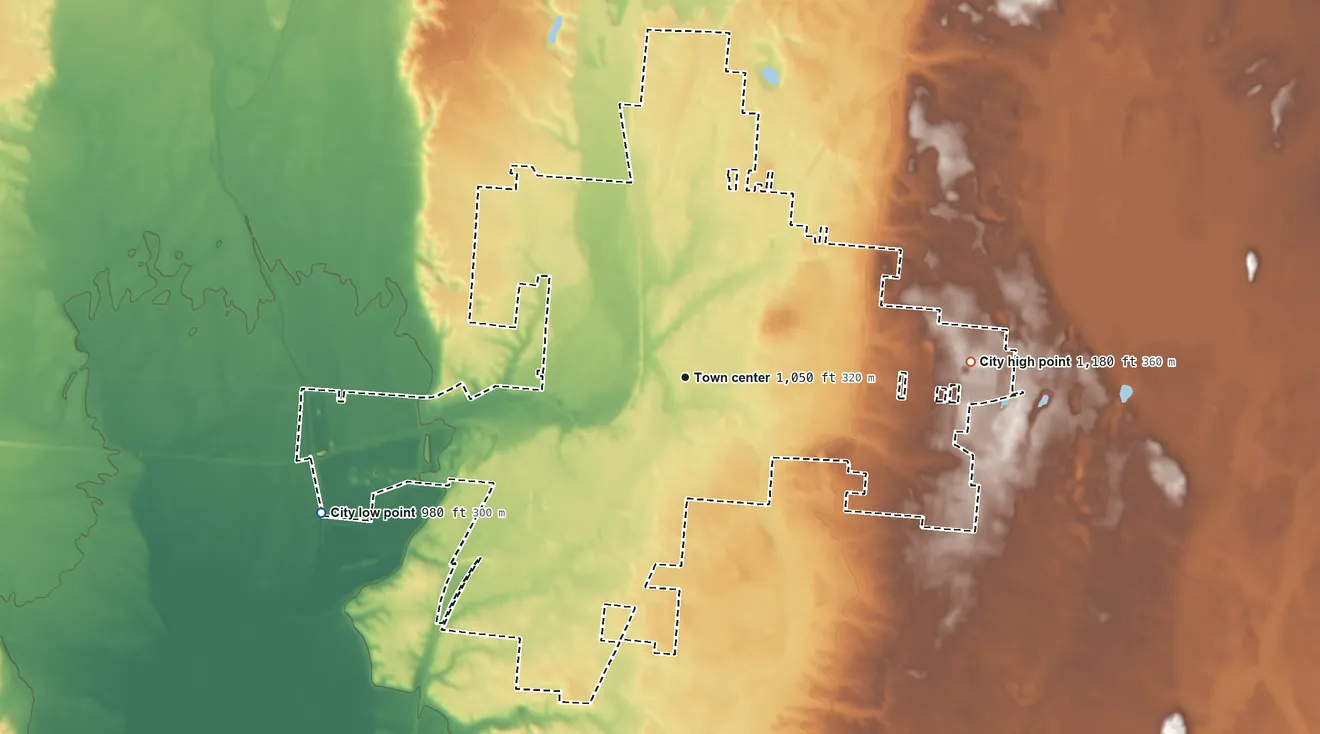 Topographic elevation map of Urbana, Ohio, shaded from 980 ft on the west side to 1,180 ft on the east side