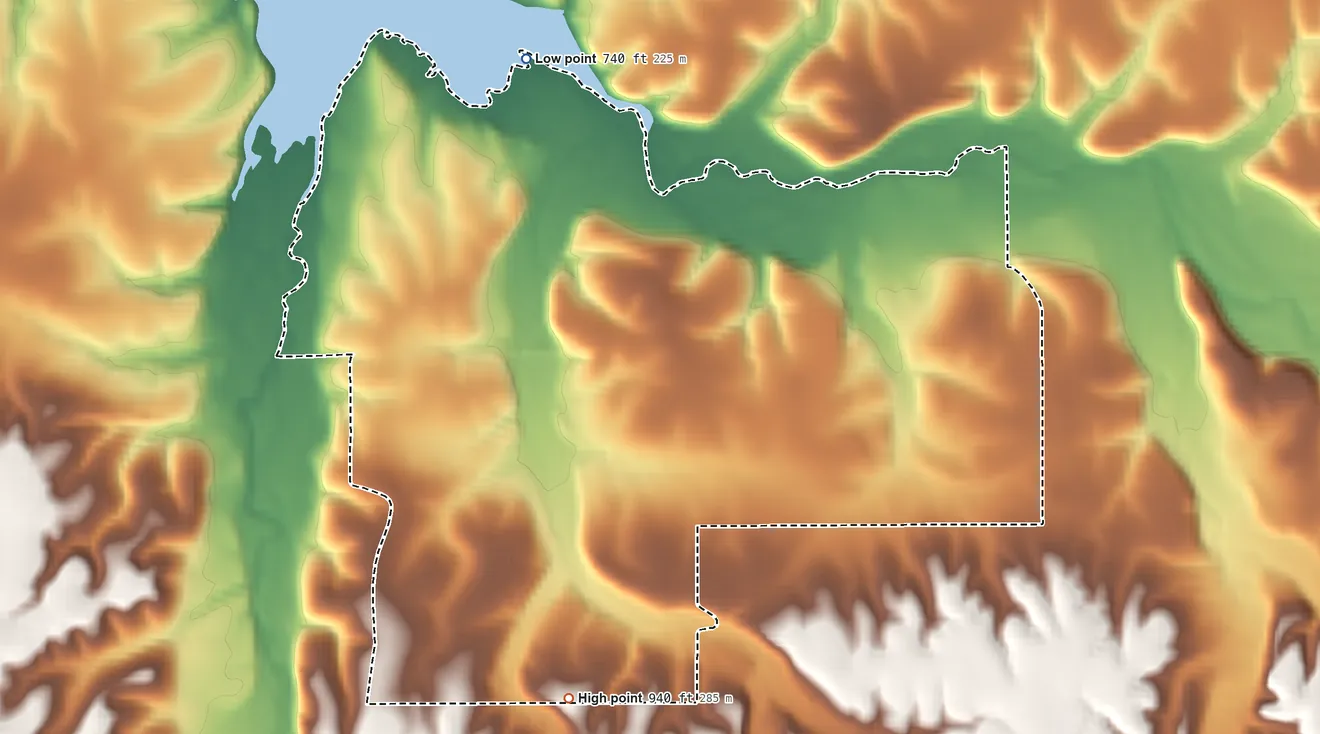 Topographic elevation map of Butler, Delaware County, Oklahoma, shaded from 740 ft on the north side to 940 ft on the southwest side