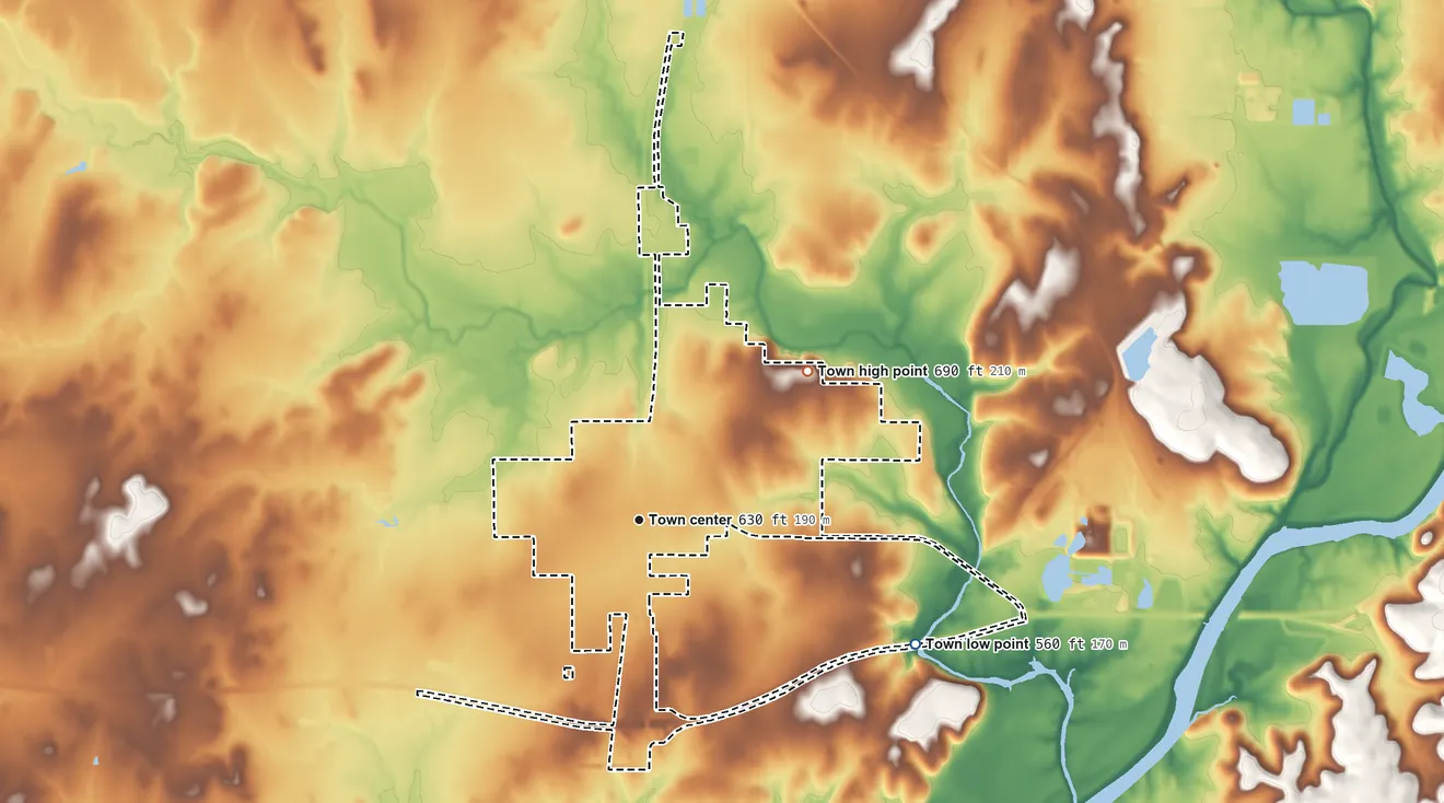 Topographic elevation map of Chouteau, Oklahoma, shaded from 560 ft on the southeast side to 690 ft on the northeast side