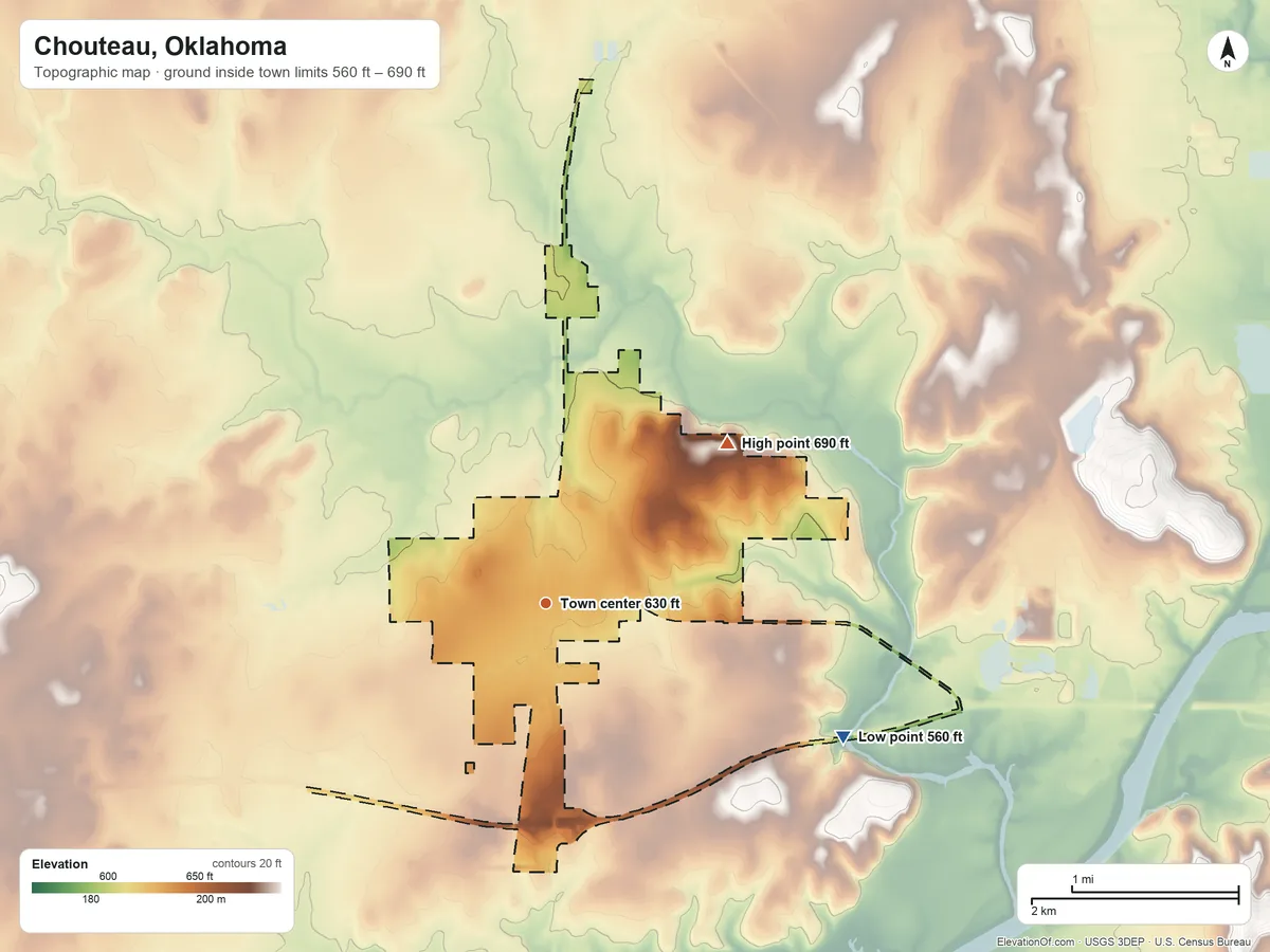Topographic elevation map of Chouteau, Oklahoma, shaded from 560 ft on the southeast side to 690 ft on the northeast side