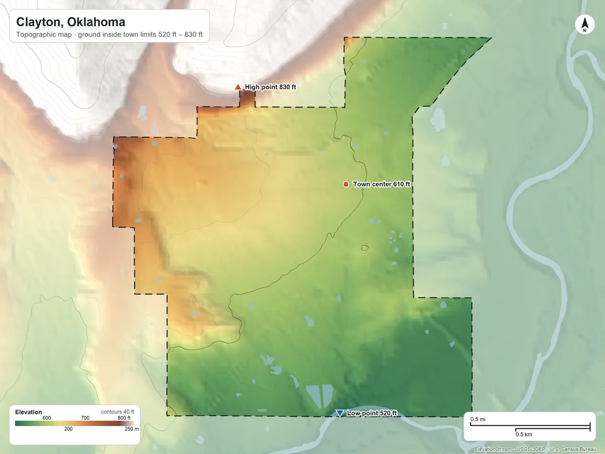 Topographic elevation map of Clayton, Oklahoma, shaded from 520 ft on the south side to 830 ft on the northwest edge, below higher ground just outside