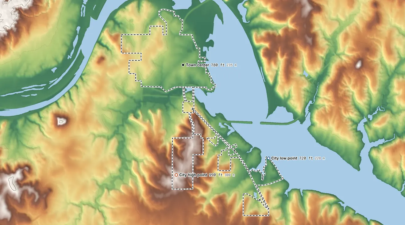 Topographic elevation map of Cleveland, Oklahoma, shaded from 720 ft on the southeast side to 990 ft on the south side