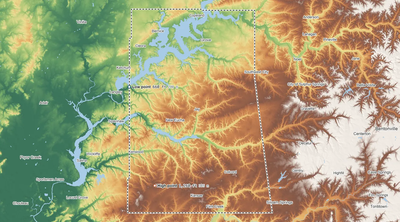 Topographic elevation map of Delaware County, Oklahoma, shaded from 660 ft on the west side to 1,260 ft on the southwest side