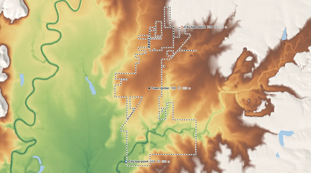Topographic elevation map of Dewey, Oklahoma, shaded from 660 ft on the south side to 730 ft on the northeast side