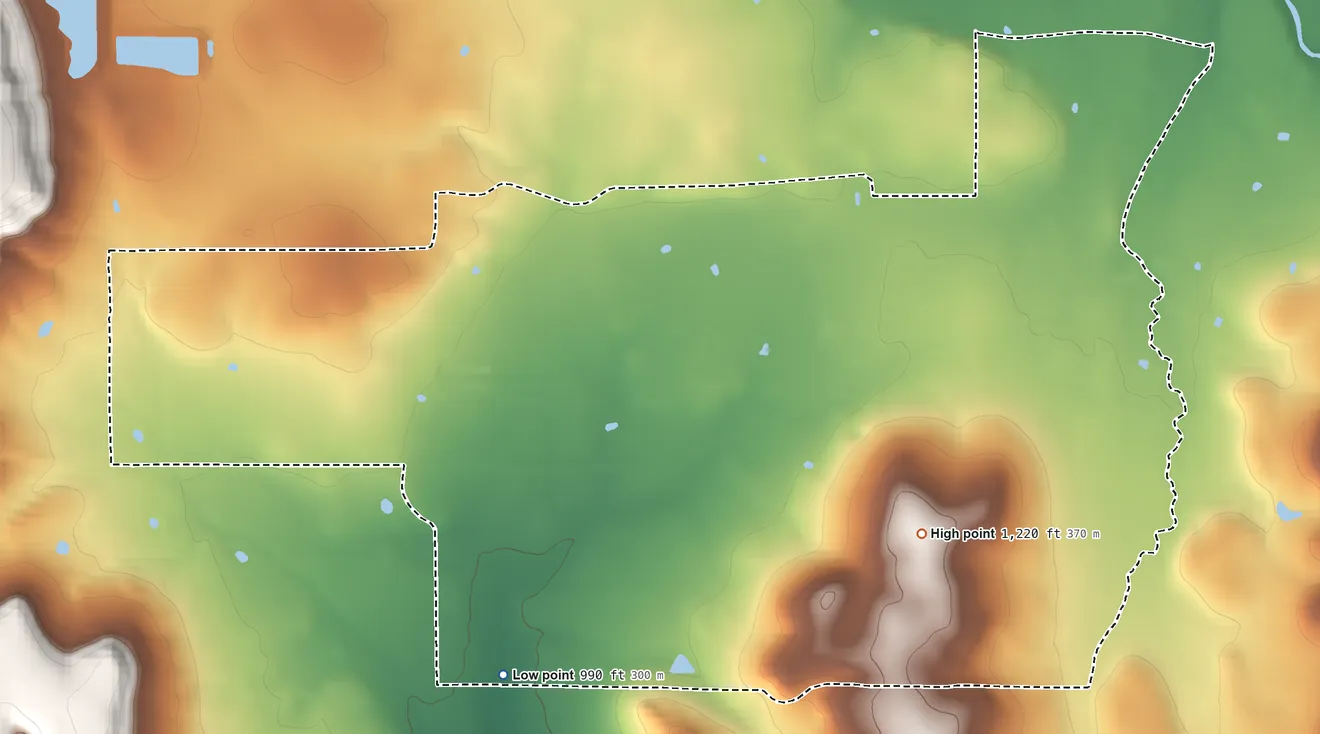 Topographic elevation map of Elm Grove, Oklahoma, shaded from 990 ft on the west side to 1,220 ft near the middle