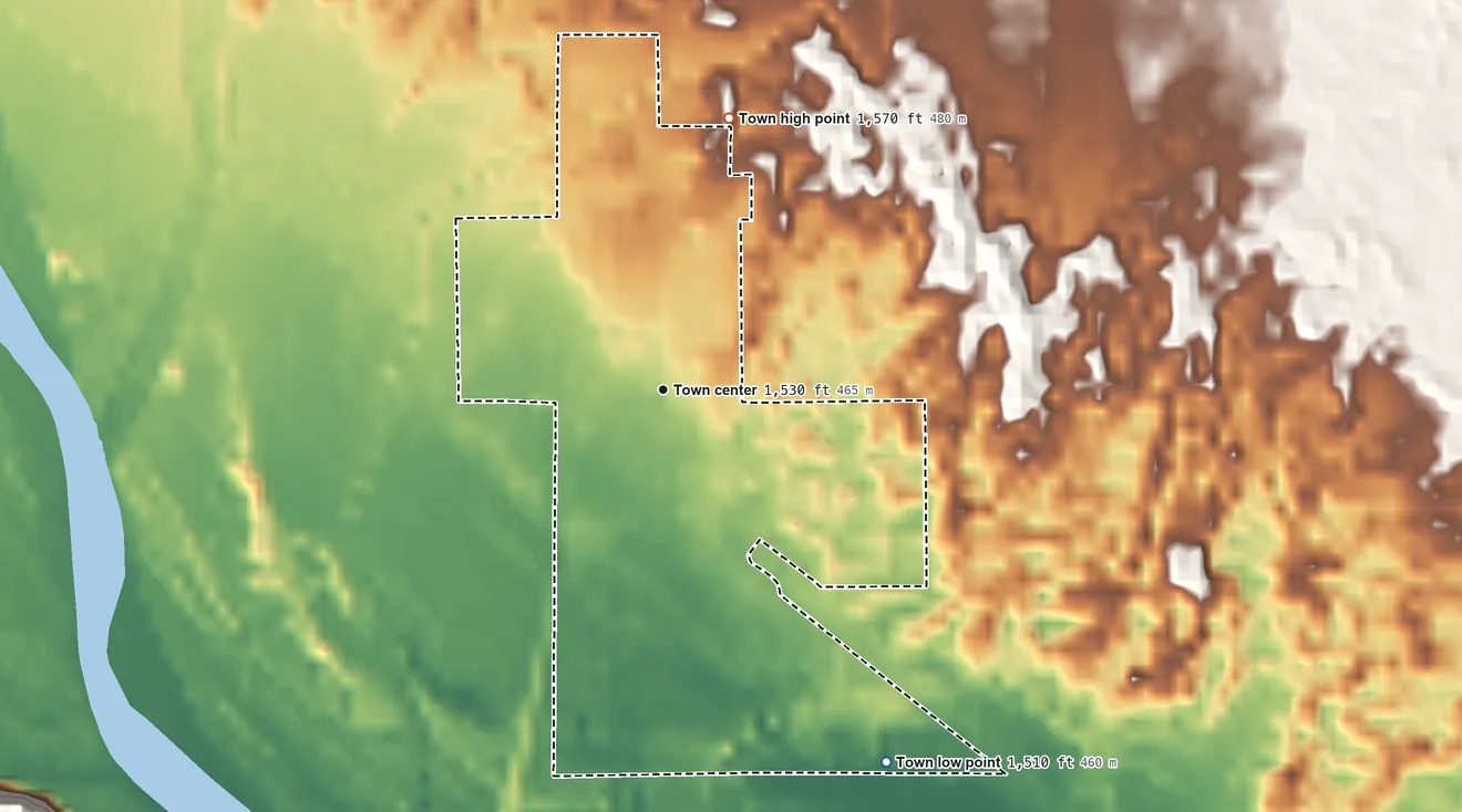 Topographic elevation map of Freedom, Oklahoma, shaded from 1,510 ft on the southeast side to 1,570 ft on the north side