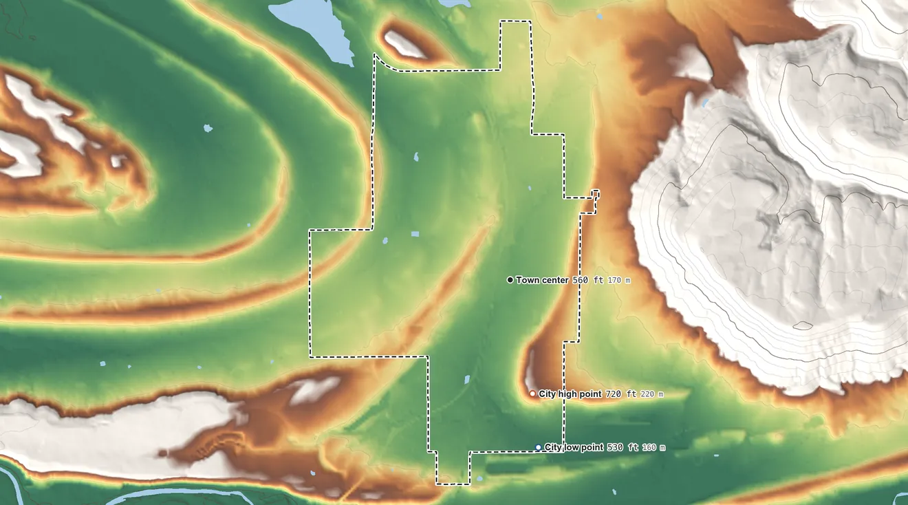 Topographic elevation map of Heavener, Oklahoma, shaded from 530 ft on the south side to 720 ft at the foot of the Sugar Loaf Mountains