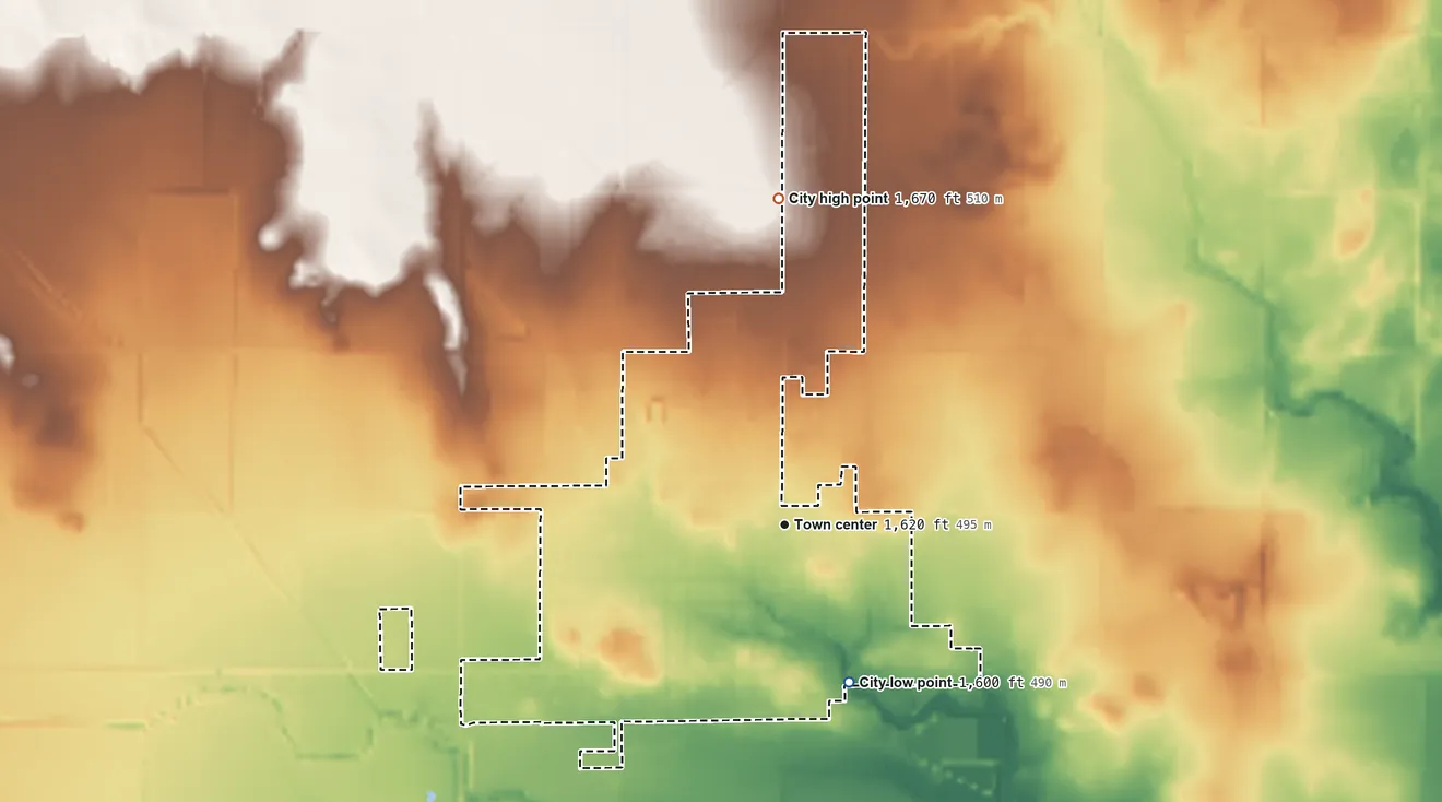 Topographic elevation map of Hollis, Oklahoma, shaded from 1,600 ft on the south side to 1,670 ft on the north side