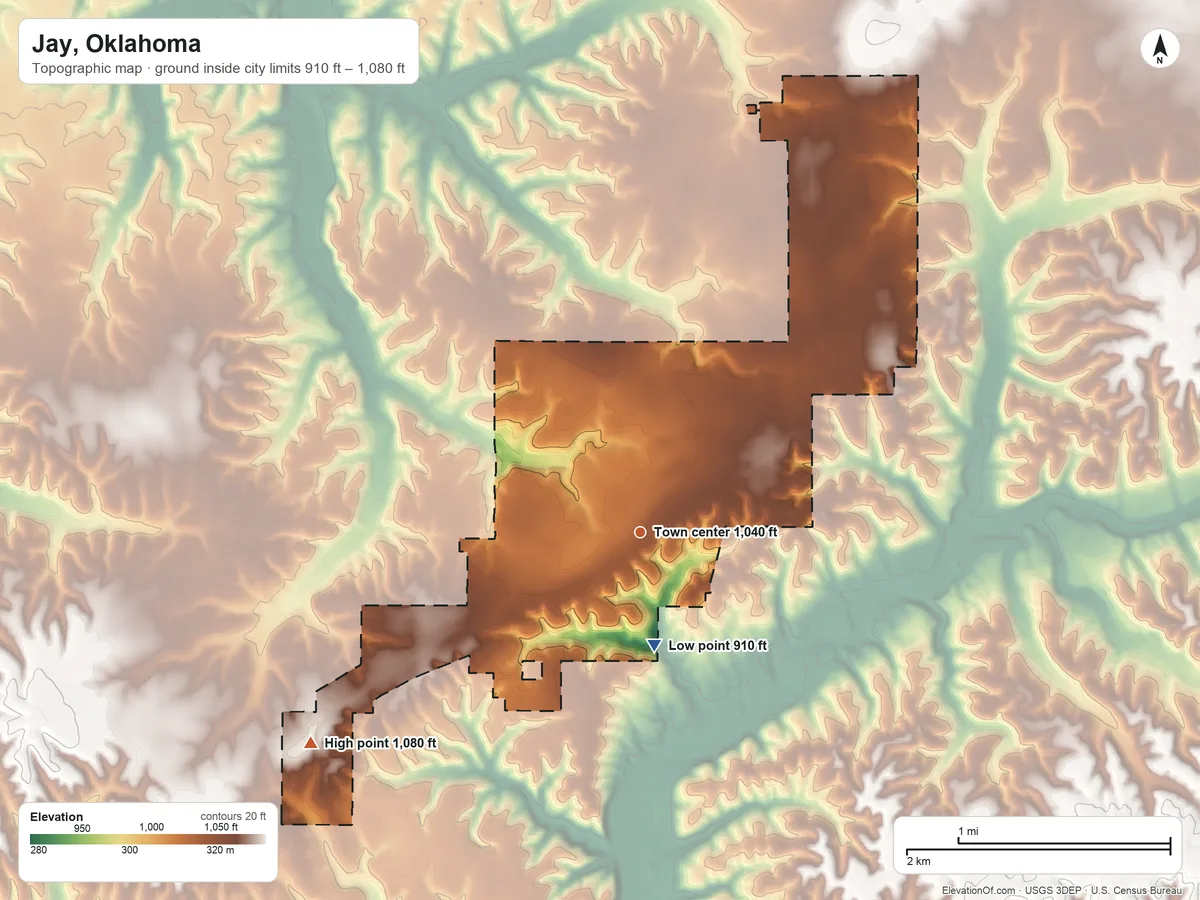 Topographic elevation map of Jay, Oklahoma, shaded from 910 ft on the south side to 1,080 ft on the southwest side