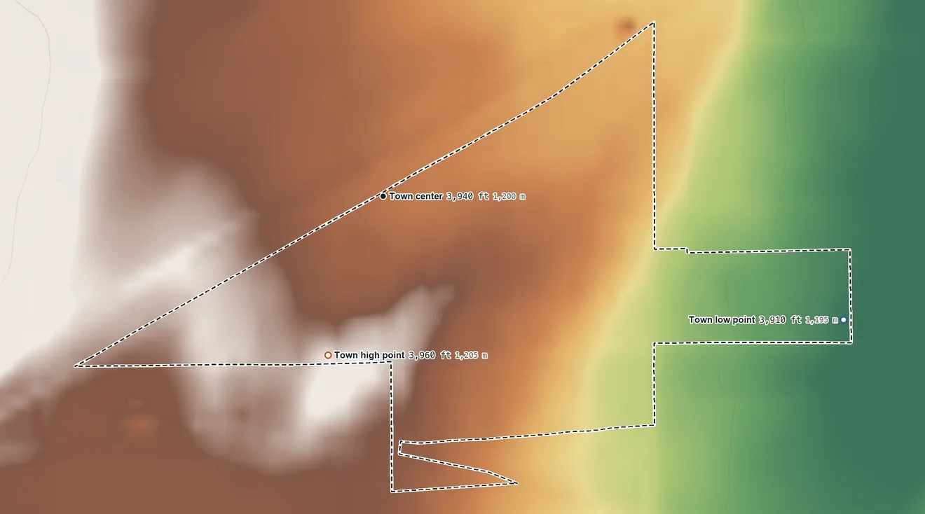 Topographic elevation map of Keyes, Oklahoma, shaded from 3,910 ft on the east side to 3,960 ft on the south side