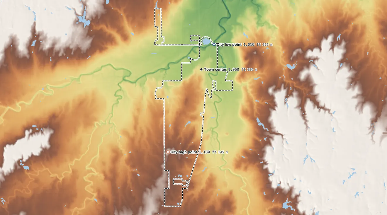 Topographic elevation map of Kingfisher, Oklahoma, shaded from 1,010 ft on the northeast side to 1,130 ft on the south side