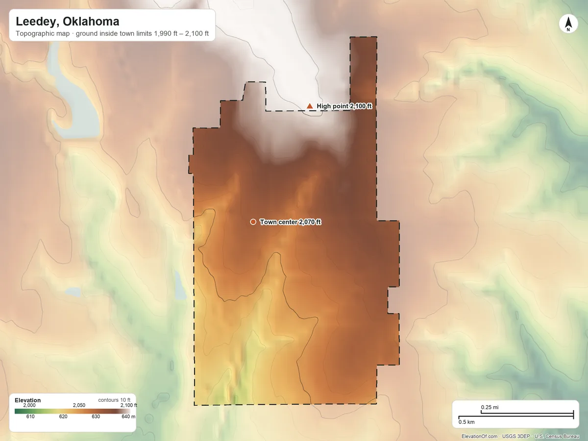 Topographic elevation map of Leedey, Oklahoma, shaded from 1,990 ft on the south side to 2,100 ft on the northeast side