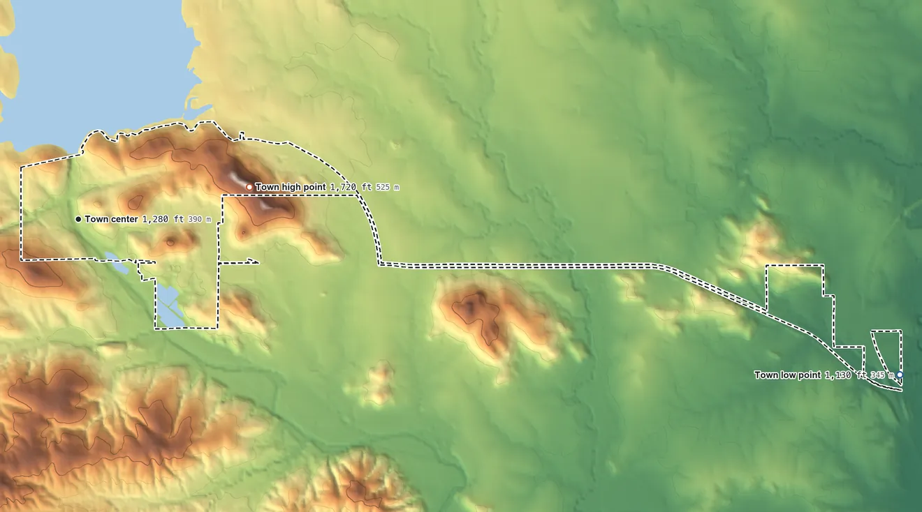 Topographic elevation map of Medicine Park, Oklahoma, shaded from 1,130 ft on the east side to 1,720 ft on Mount Cummins