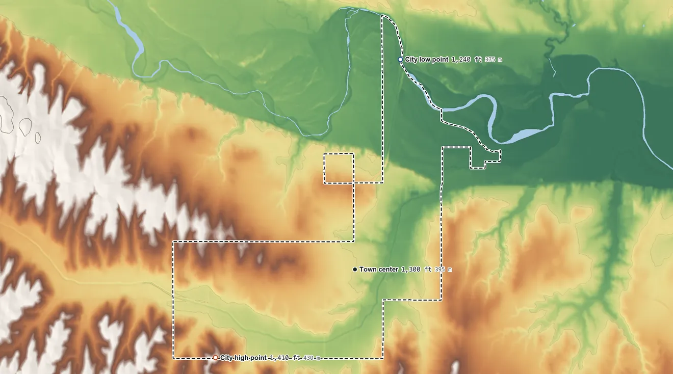 Topographic elevation map of Minco, Oklahoma, shaded from 1,240 ft on the north side to 1,410 ft on the southwest side