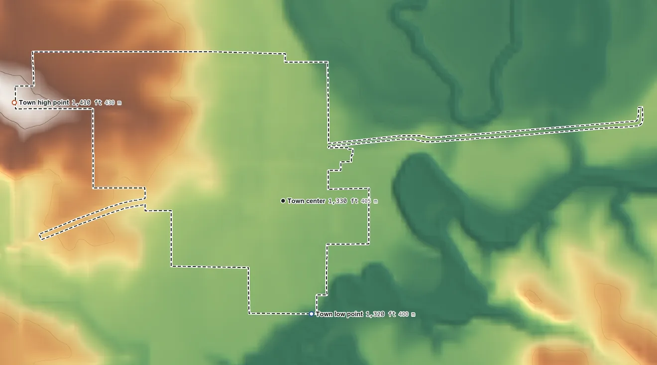 Topographic elevation map of Mountain View, Oklahoma, shaded from 1,320 ft on the south side to 1,410 ft on the west side