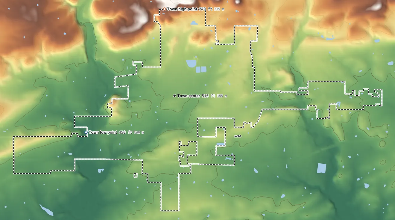 Topographic elevation map of Muldrow, Oklahoma, shaded from 450 ft on the west side to 770 ft on the north side