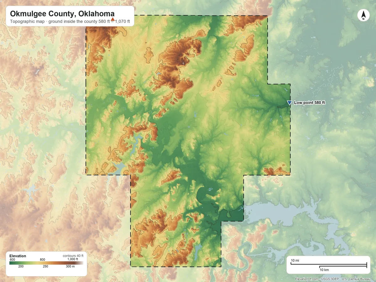 Topographic elevation map of Okmulgee County, Oklahoma, shaded from 580 ft on the east side to 1,070 ft on the northwest side