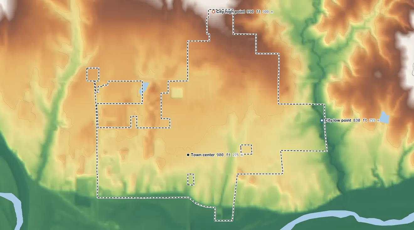 Topographic elevation map of Perkins, Oklahoma, shaded from 830 ft on the east side to 990 ft on the north side