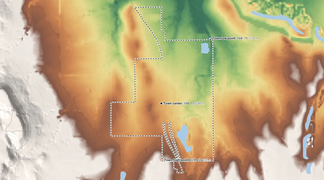 Topographic elevation map of Porum, Oklahoma, shaded from 560 ft on the northeast side to 620 ft at the foot of the Rattlesnake Mountains