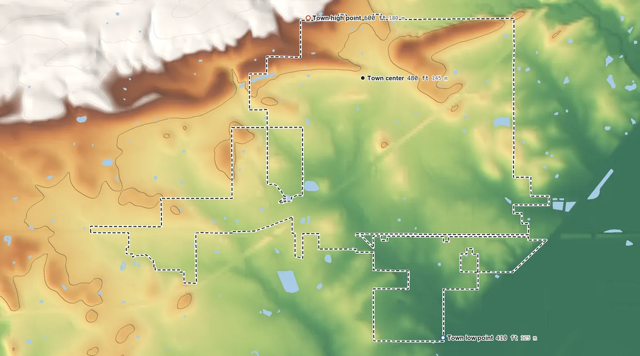 Topographic elevation map of Roland, Oklahoma, shaded from 410 ft on the south side to 600 ft on the northwest edge, below higher ground just outside