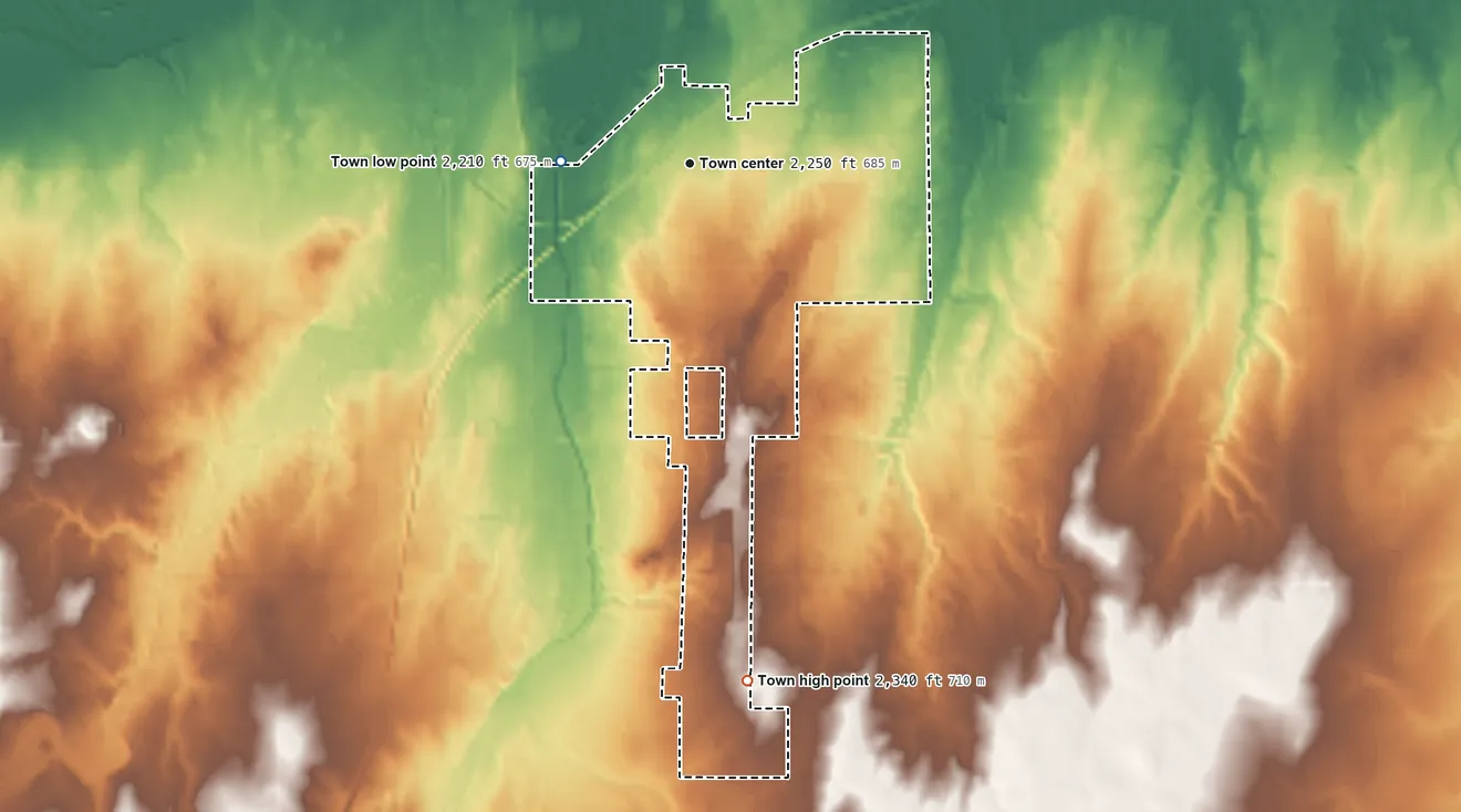 Topographic elevation map of Shattuck, Oklahoma, shaded from 2,210 ft on the west side to 2,340 ft on the south side