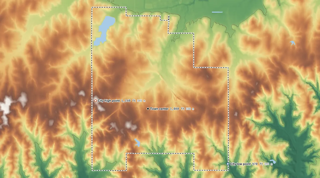 Topographic elevation map of Tecumseh, Oklahoma, shaded from 970 ft on the southeast side to 1,140 ft on the west side
