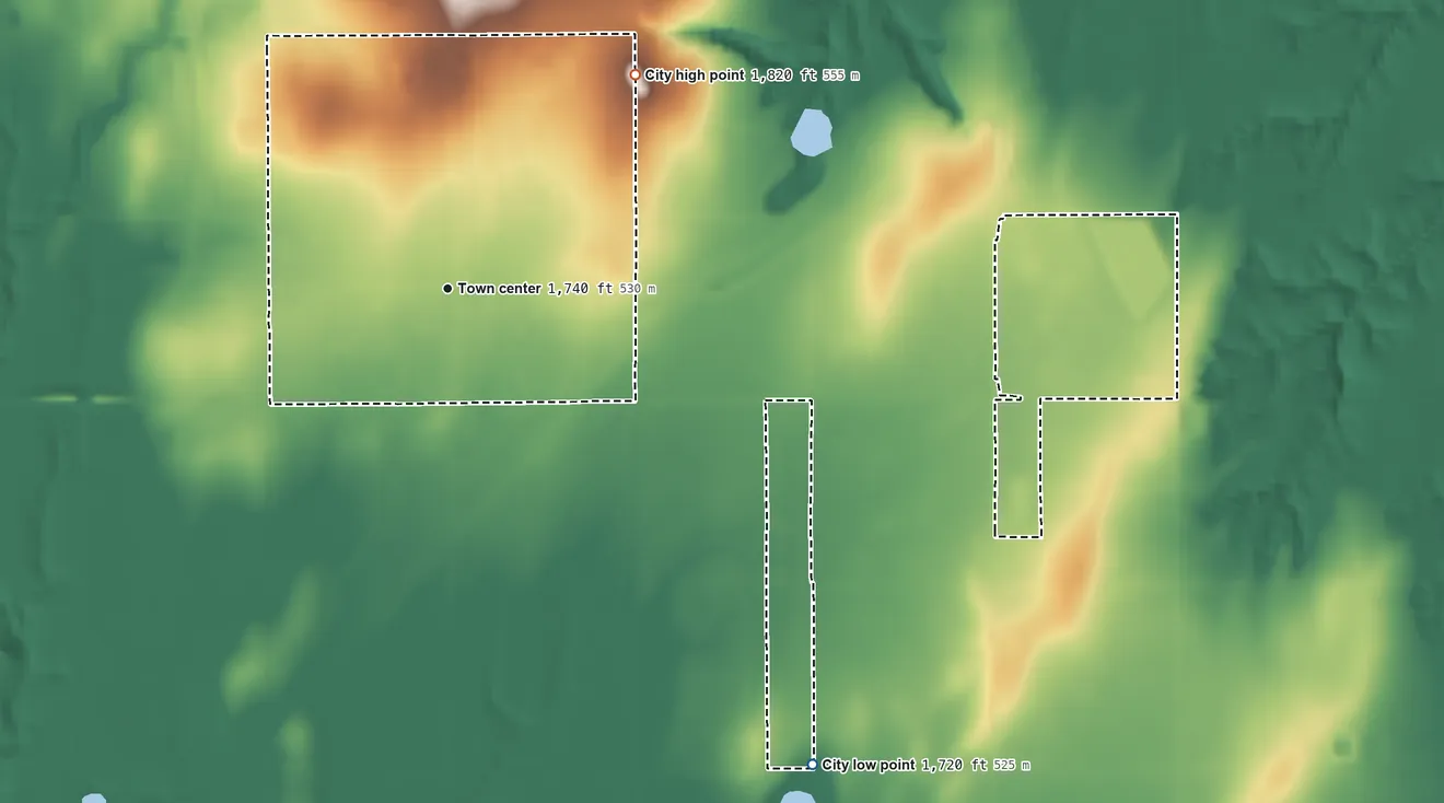 Topographic elevation map of Thomas, Oklahoma, shaded from 1,720 ft on the southeast side to 1,820 ft on the northeast side