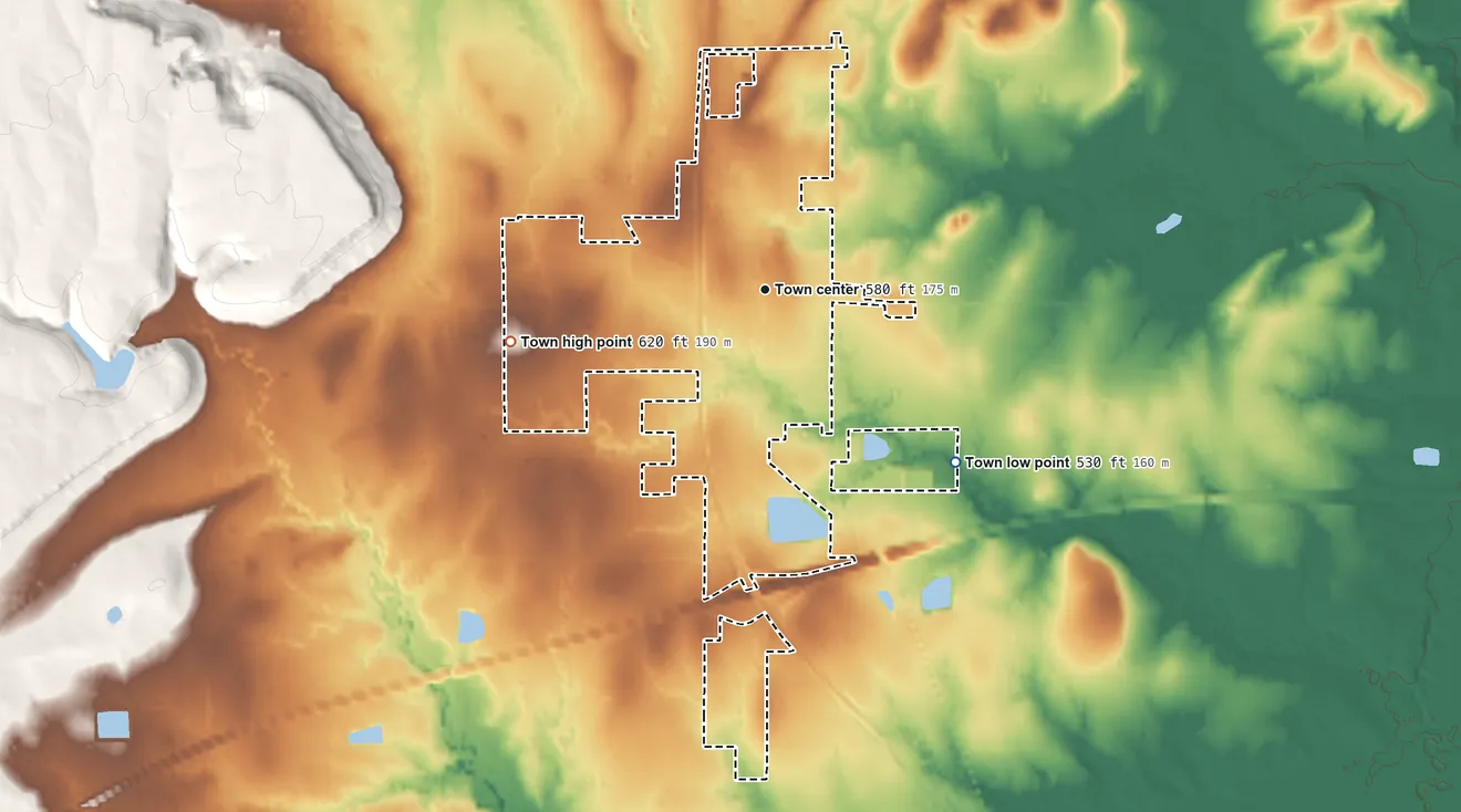 Topographic elevation map of Warner, Oklahoma, shaded from 530 ft on the southeast side to 620 ft on the west side