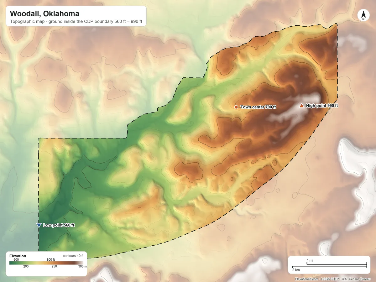 Topographic elevation map of Woodall, Oklahoma, shaded from 560 ft on the southwest side to 990 ft on the east side