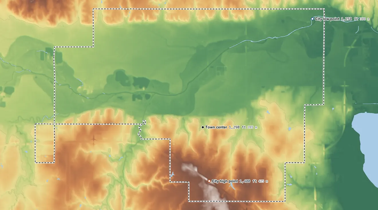 Topographic elevation map of Yukon, Oklahoma, shaded from 1,250 ft on the northeast side to 1,400 ft on the south side