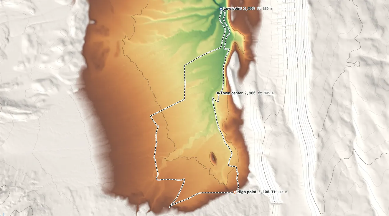 Topographic elevation map of Camp Sherman, Oregon, shaded from 2,890 ft on the north side to 3,100 ft on the south edge, below higher ground just outside