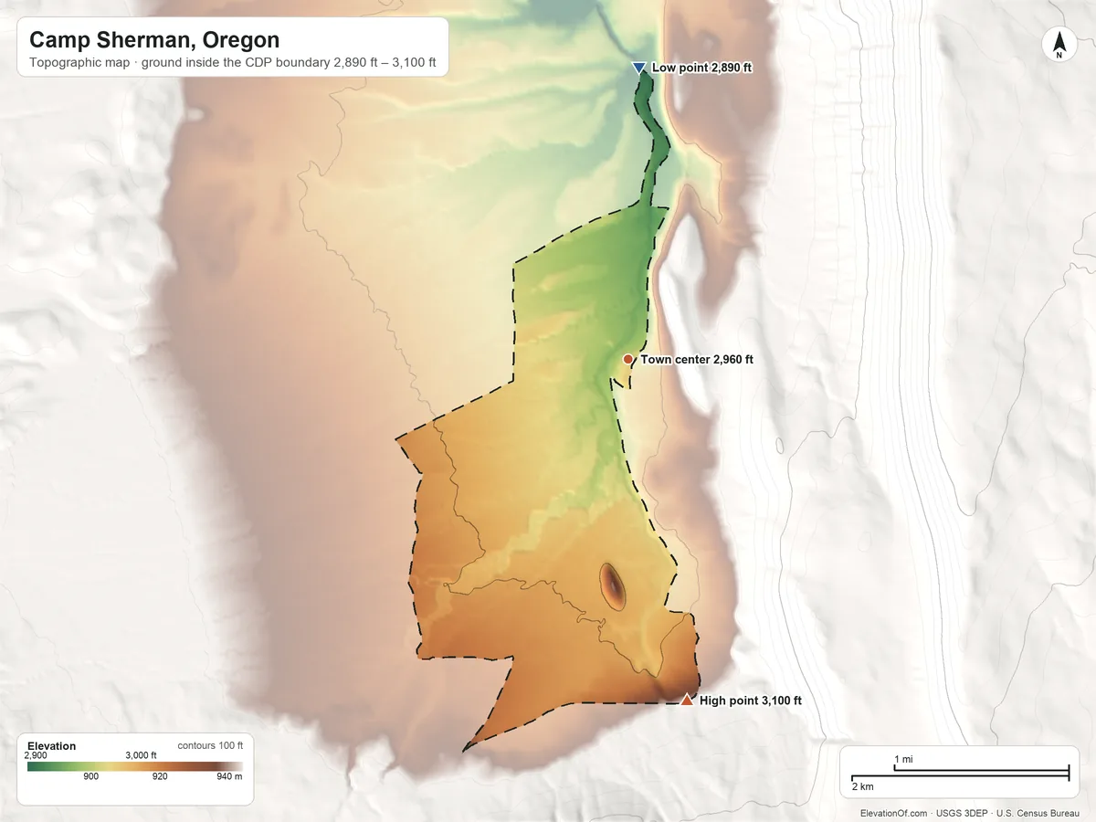 Topographic elevation map of Camp Sherman, Oregon, shaded from 2,890 ft on the north side to 3,100 ft on the south edge, below higher ground just outside