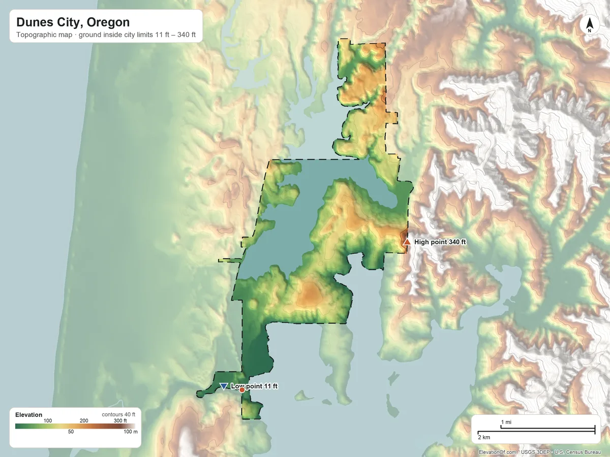 Topographic elevation map of Dunes City, Oregon, shaded from 11 ft near the middle to 340 ft on the northeast edge, below higher ground just outside