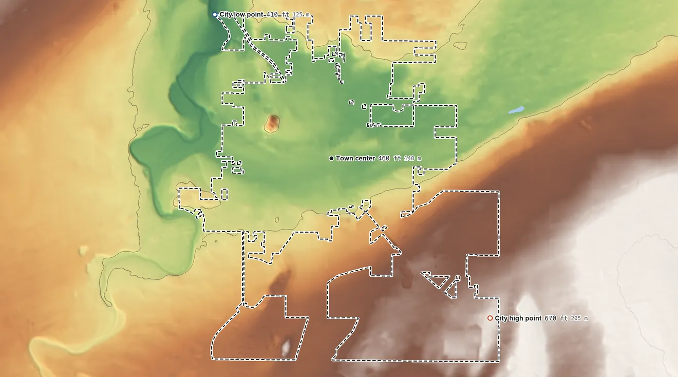 Topographic elevation map of Hermiston, Oregon, shaded from 410 ft on the northwest side to 670 ft on the southeast side