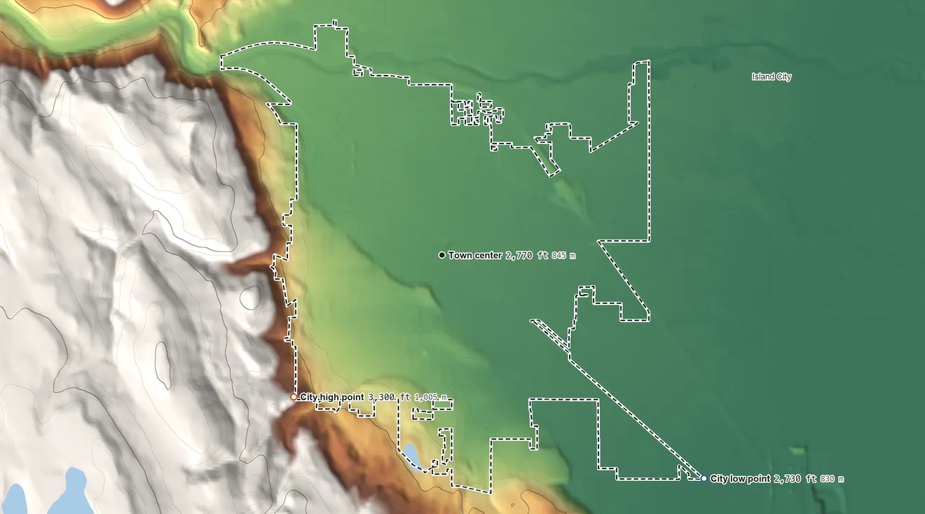 Topographic elevation map of La Grande, Oregon, shaded from 2,730 ft on the southeast side to 3,300 ft at the foot of the Blue Mountains