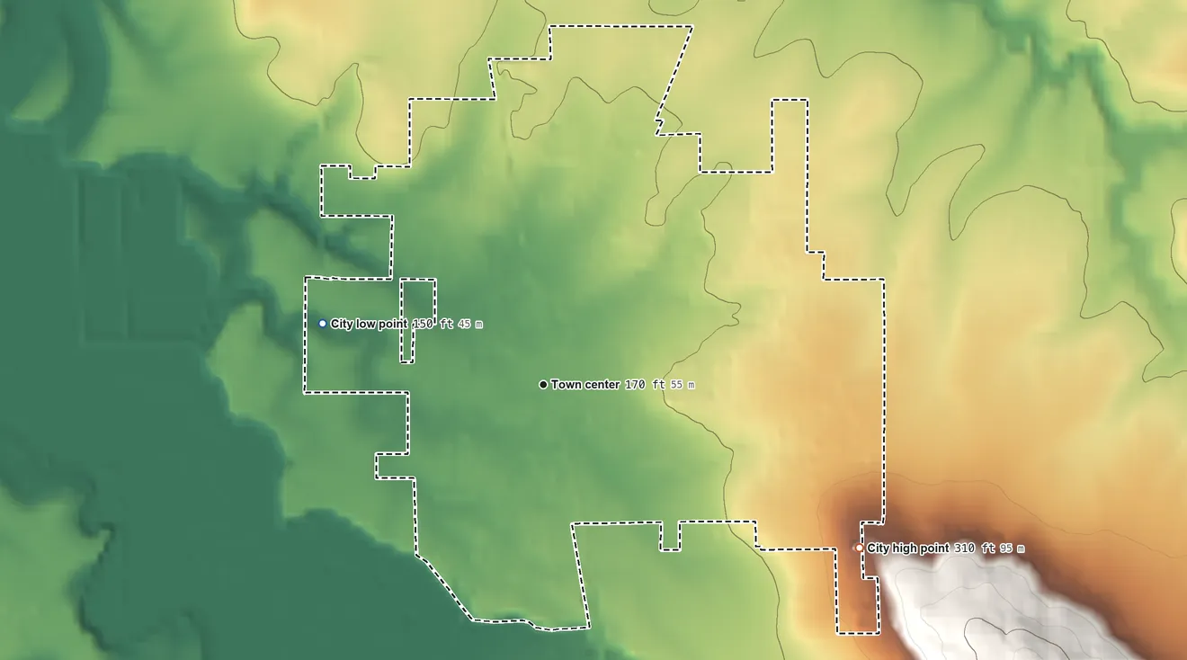Topographic elevation map of Mount Angel, Oregon, shaded from 150 ft on the west side to 310 ft on the southeast side