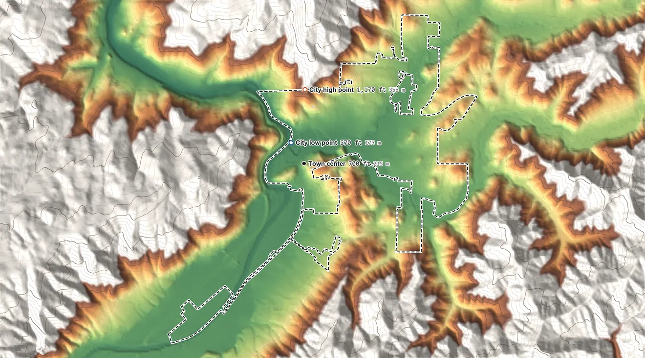 Topographic elevation map of Myrtle Creek, Oregon, shaded from 570 ft near the middle to 1,170 ft on the north edge, below higher ground just outside