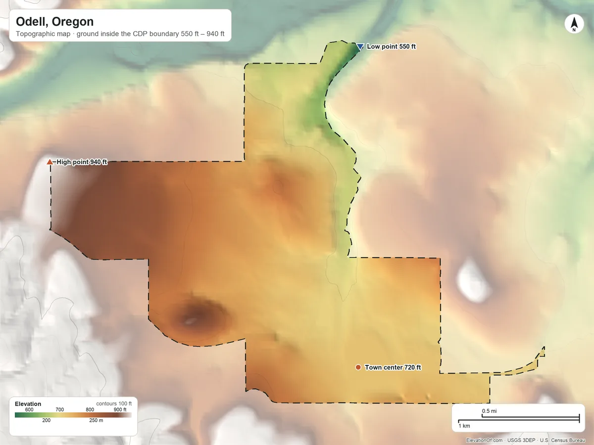 Topographic elevation map of Odell, Oregon, shaded from 550 ft on the north side to 940 ft on the northwest edge, below higher ground just outside