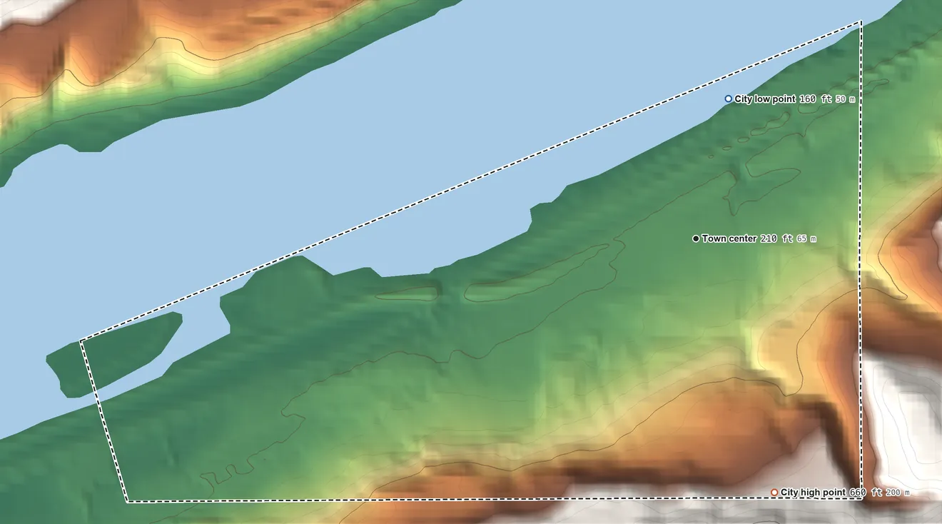 Topographic elevation map of Rufus, Oregon, shaded from 160 ft on the north side to 660 ft on the south edge, below higher ground just outside