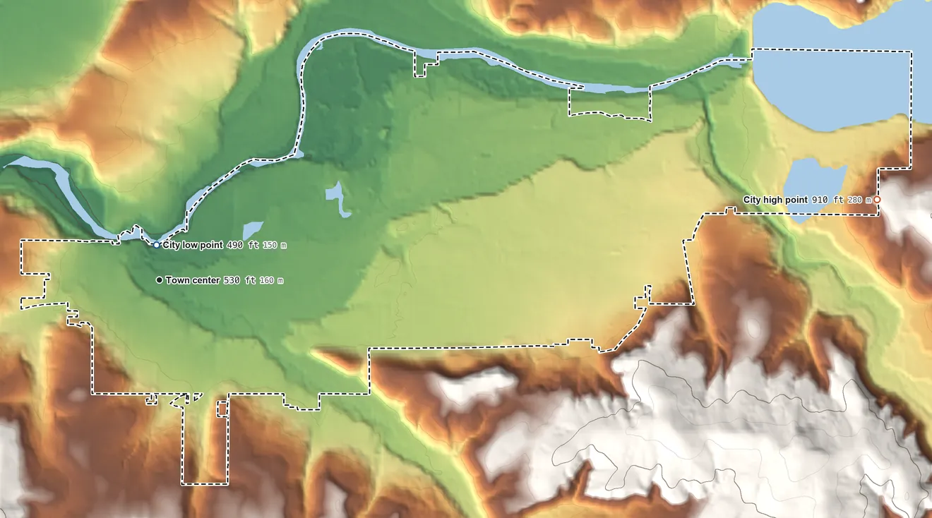 Topographic elevation map of Sweet Home, Oregon, shaded from 490 ft near the middle to 910 ft on the east edge, below higher ground just outside