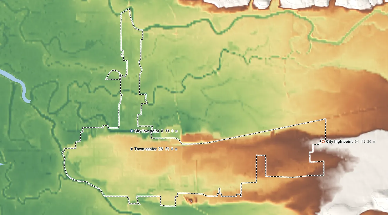 Topographic elevation map of Tillamook, Oregon, shaded from 0 ft near the middle to 64 ft on the east edge, below higher ground just outside