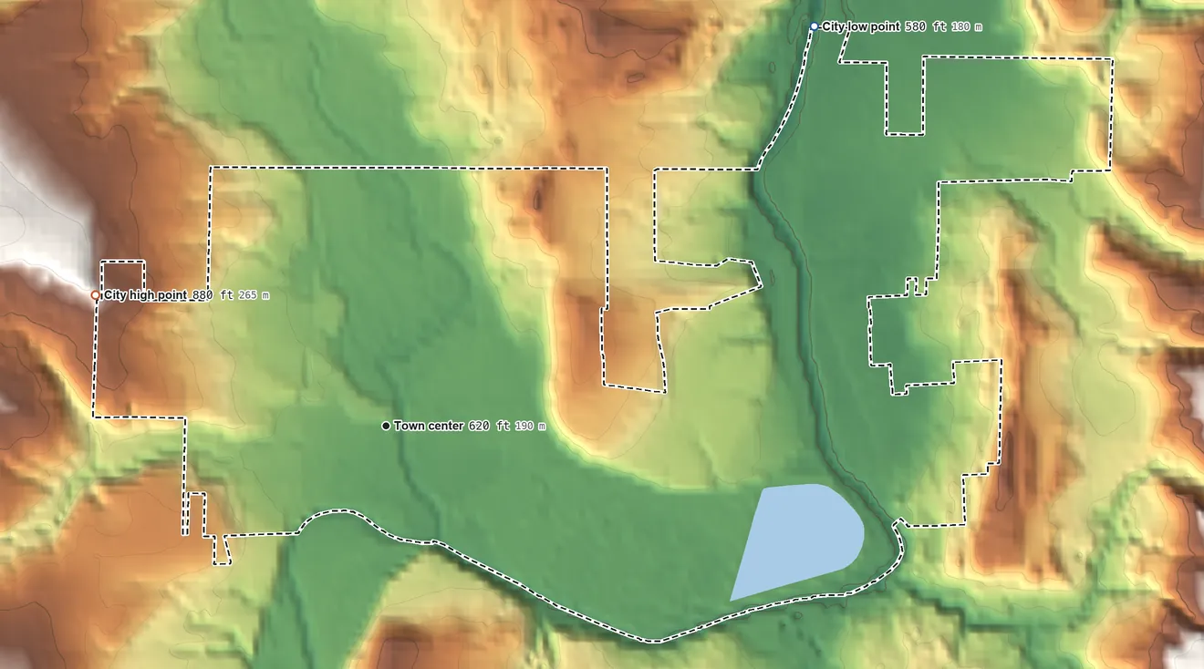 Topographic elevation map of Vernonia, Oregon, shaded from 580 ft on the northeast side to 880 ft on the northwest side