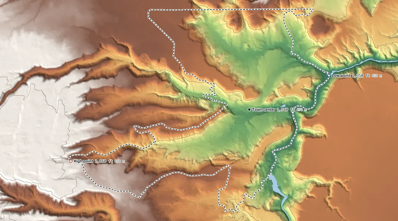 Topographic elevation map of Warm Springs, Oregon, shaded from 1,350 ft on the northeast side to 2,860 ft on the west side